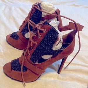 Brown and black suede lace up heels. Never worn